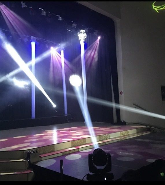 Moving-head lights on a stage